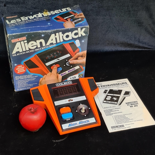 139 - A fantastic retro Coleco Alien Attack hand held space battle game. Complete in original box.