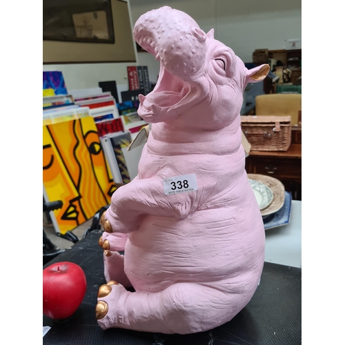 338 - A humorous pink large  figure of a smiling hippopotamus. Brand new from a top UK Interior design com... 