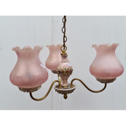 346 - A very pretty three branch brass ceiling light with three hand blown glass shades.