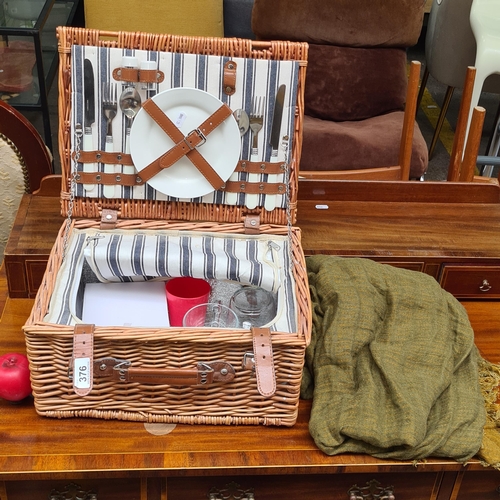 376 - A very sweet picnic basket set including cutlery, mini jars, two plates, two wine glasses and two gl... 