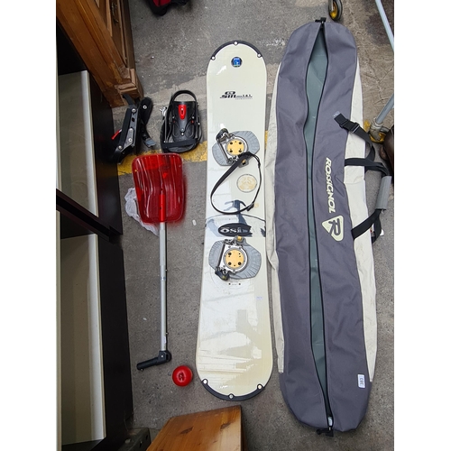 383 - An Osin numeric 161 snowboard Model No. r21390 with accessories travel carry case.