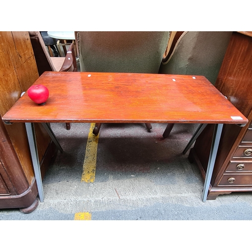 389 - A mid century  style coffee table with metal frame, tapered legs and wooden painted top.