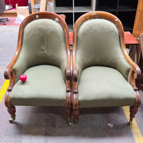 391 - Star Lot : A fabulous  pair of highly attractive Victorian walnut armchairs. Featuring spoon shaped ... 