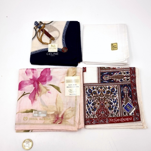 14 - A collection of four designer silk & cotton scarves. Dimensions: 58 cms square. Items as per photogr... 