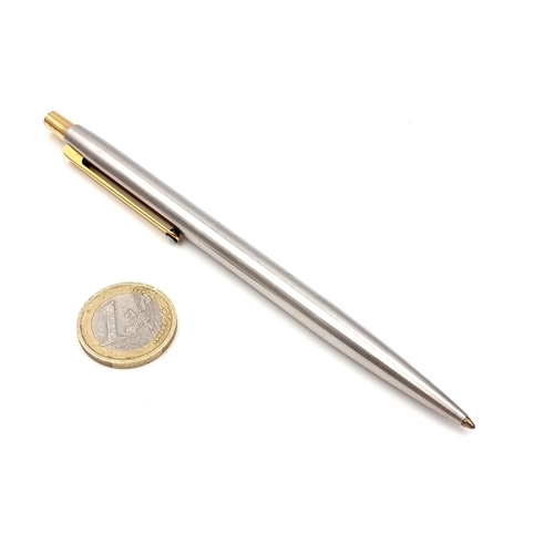 17 - A very nice example of a Mont Blanc ballpoint pen set in brushed chrome with gold metal detailing. P... 