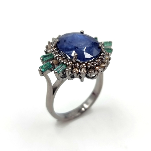 29 - Star Lot : A most unusual sapphire gemstone ring set with emeralds and diamonds. Ring size - N. Weig... 