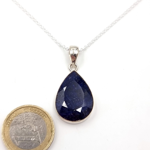 32 - Star Lot : A huge 16 carat sapphire facet cut gemstone teardrop pendant mounted in sterling silver a... 