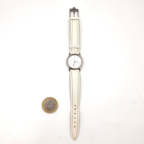 6 - Star lot : A genuine Omega De Ville  wristwatch with quartz mechanism. Time can be adjusted by touch... 