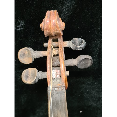 107 - Star Lot : A vintage wooden violin. Labelled Antonius Stradivarius, Cremona 1715 to interior.