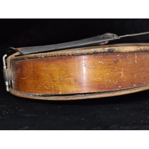 107 - Star Lot : A vintage wooden violin. Labelled Antonius Stradivarius, Cremona 1715 to interior.