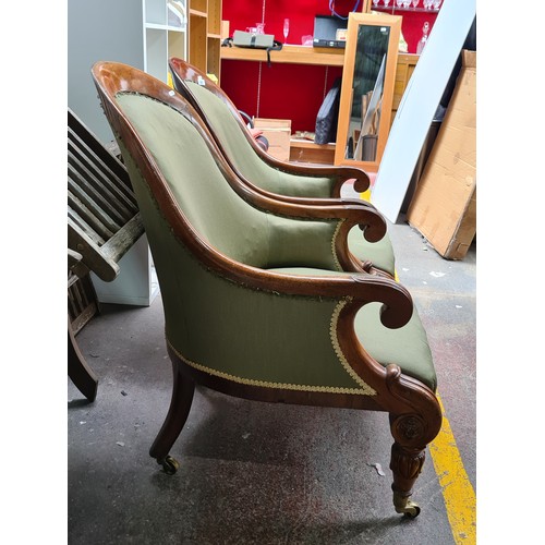 391 - Star Lot : A fabulous  pair of highly attractive Victorian walnut armchairs. Featuring spoon shaped ... 