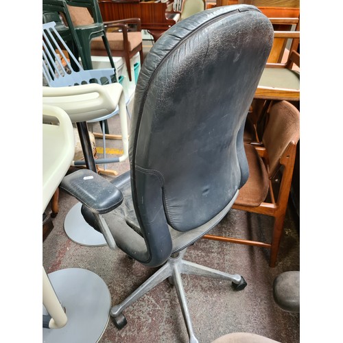 395 - Star Lot : A cool vintage  tall black leather adjustable Herman Miller office chair with arm support... 