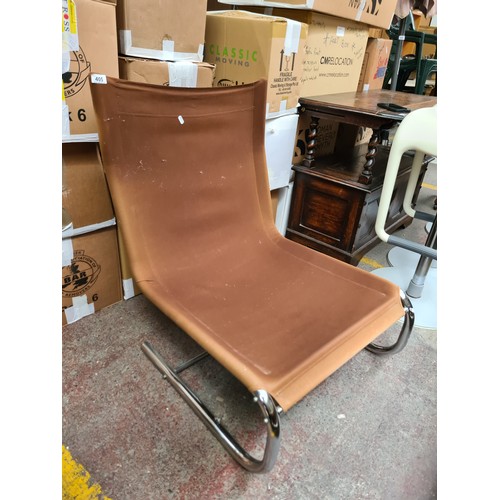 405 - Star Lot : Mid-Century Modern brown suede 1970s and chrome tubular cantilever chair with adjustable ... 