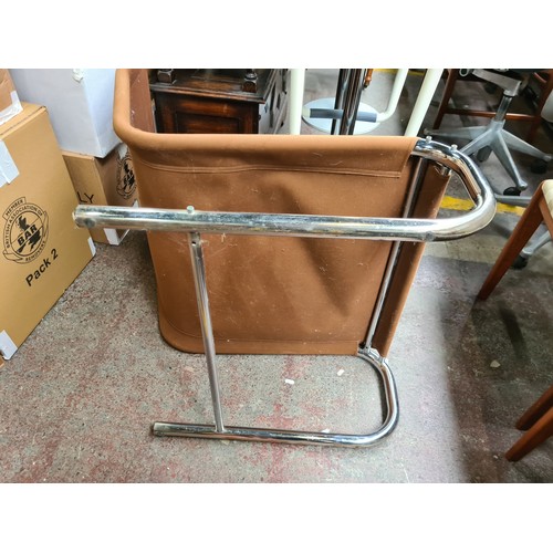 405 - Star Lot : Mid-Century Modern brown suede 1970s and chrome tubular cantilever chair with adjustable ... 