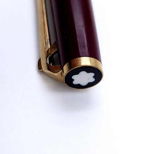 2 - An original Mont Blanc ballpoint pen set with gold metal detailing. Pen working. With the snowy peak... 