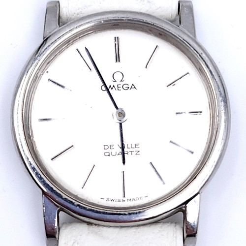 6 - Star lot : A genuine Omega De Ville  wristwatch with quartz mechanism. Time can be adjusted by touch... 