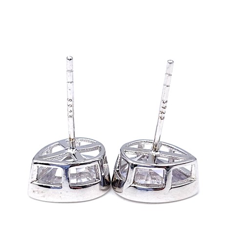 9 - A pair of new Silvora gem set sterling silver stud earrings. Weight - 2.38 grams. Stamped 925. In or... 