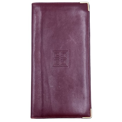 12 - A Givenchy designer  leather wallet marked in 'Made in Spain'. Dimensions: 18 x 9.5 cms. Wallet in g... 