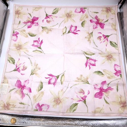 14 - A collection of four designer silk & cotton scarves. Dimensions: 58 cms square. Items as per photogr... 