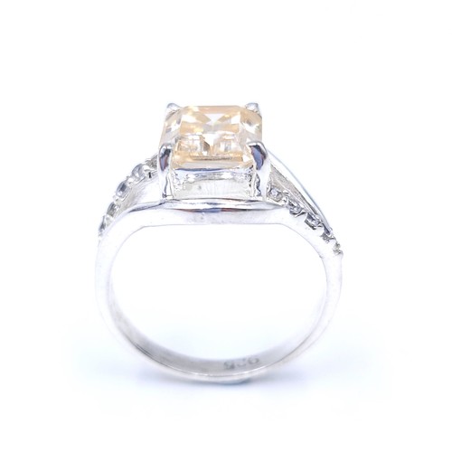 21 - Star Lot : A fabulous golden moissanite gemstone ring together with a diamond set twist mount. Ring ... 