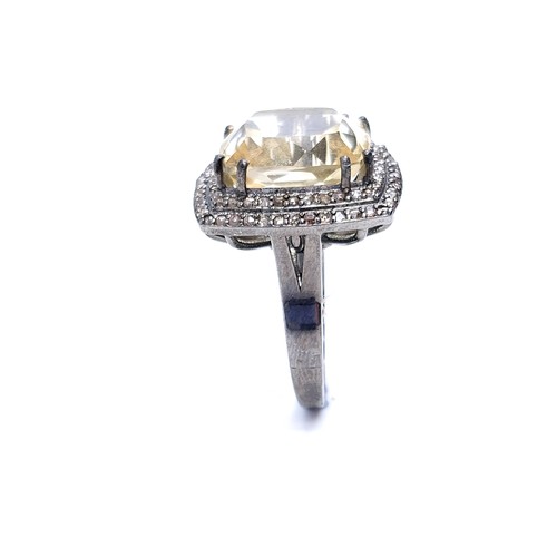 23 - Star Lot : A super example of a large art deco style natural citrine gemstone ring with diamond set ... 