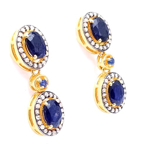 37 - Star Lot :  A pair of super pretty sapphire drop pendant stud earrings with diamond surround set in ... 