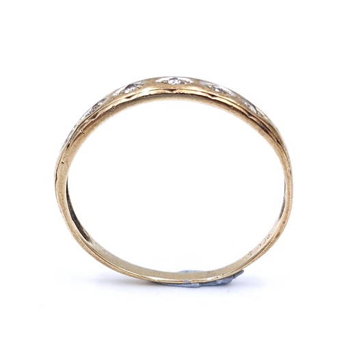 45 - A pretty diamond half eternity ring set in nine carat gold. Ring size - N. Weight is .90 grams.