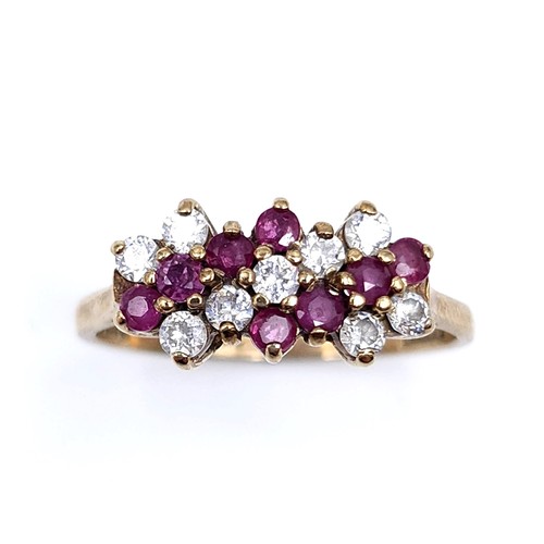 47 - Star Lot : A vintage multi-stone ruby and gem stone ring set in nine carat gold (375). Ring size - N... 