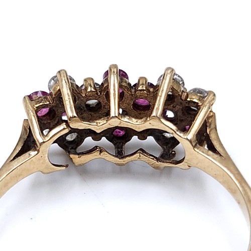 47 - Star Lot : A vintage multi-stone ruby and gem stone ring set in nine carat gold (375). Ring size - N... 