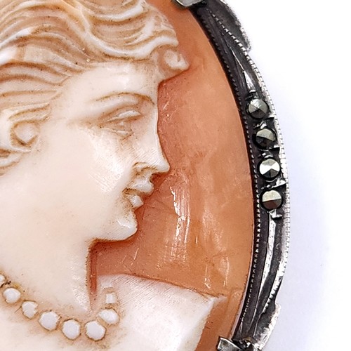 58 - Two Sterling Silver vintage cameo brooches both set with marcasite mounts with pins intact. Total we... 