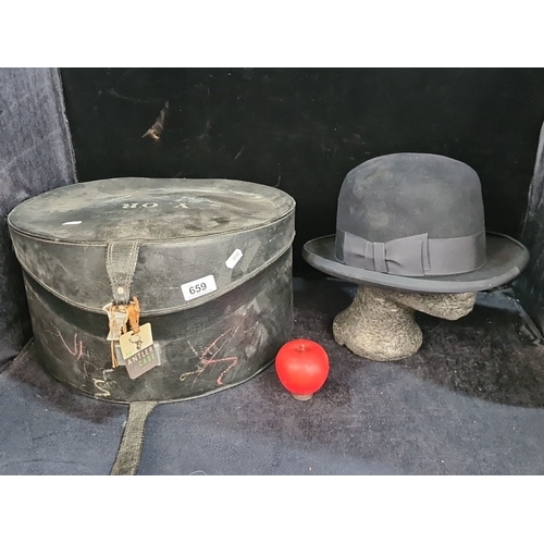 1093 - A fantastic Lincoln Bennett black felt bowler hat with satin lining. Retailed  by Switzers Dublin. C... 