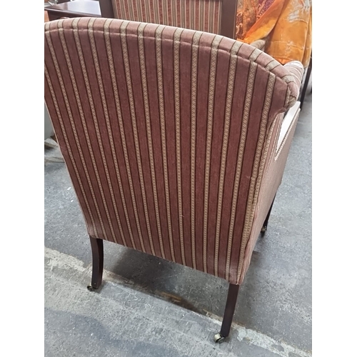 1098 - Star Lot : A beautifully Upholstered antique drawing room chair in striped fabric with wooden frame ... 