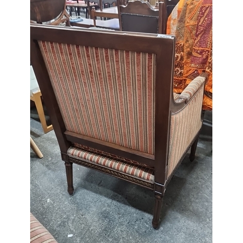 1099 - Star Lot : A beautifully Upholstered antique drawing room chair in striped fabric with wooden frame ... 