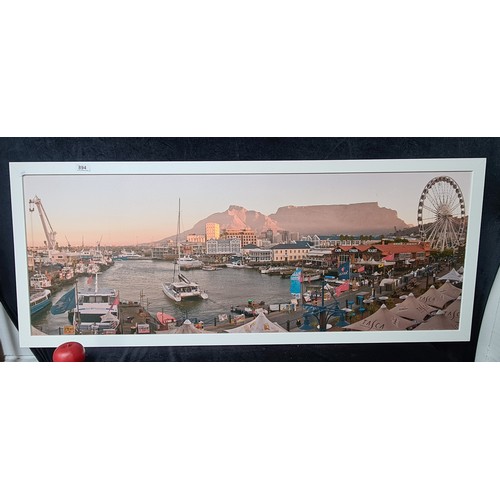 1107 - A large high quality print on canvas board featuring the 'Waterfront, Cape Town'. Housed in a wooden... 