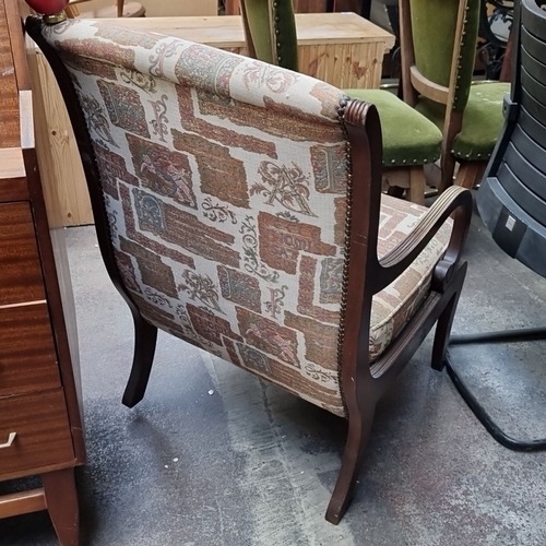 1113 - A lovely mid century armchair with curved wooden armrests and a tapestry fabric upholstery in earthy... 