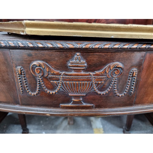 1118 - Star Lot : A stunning Sheraton large sideboard boasting intricate carvings and multiple drawers. The... 