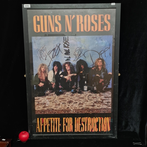 70 - A large print of a Gun N' Roses 'Appetite for Destruction' album tour poster. Housed in a black fram... 