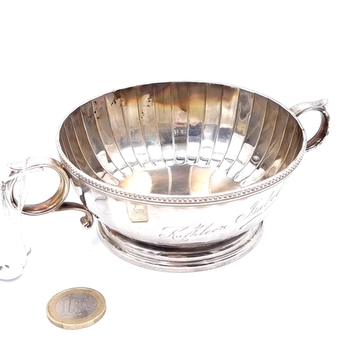 17 - A Sterling Silver nice example of a fluted dish with dot rim and flange base. Dates rubbed. Hallmark... 