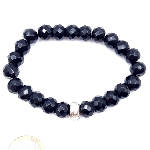 27 - A Thomas Sabo onyx facet cut bracelet with sterlong silver clasp.