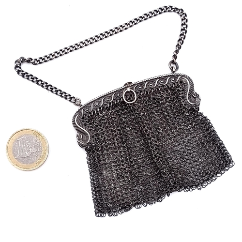 56 - Star lot : A pretty Georgian silver mesh purse hallmarked Birmingham - 1816. Total weight - 44.1 gra... 