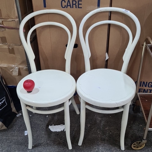 968 - Pair of classic bentwood chairs in white paint finish. They feature curved backrests and round seats... 