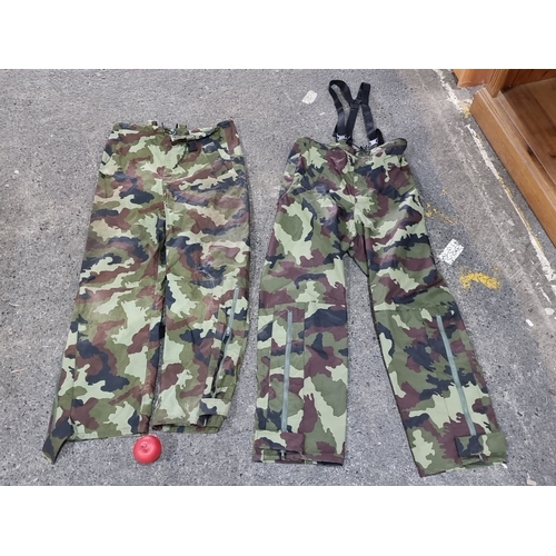 1248 - Two pairs of military camouflage trousers. One is labeled 'CANRA/SEYNTEX 2003' and is size medium. T... 