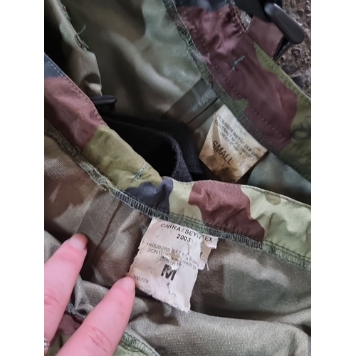 1248 - Two pairs of military camouflage trousers. One is labeled 'CANRA/SEYNTEX 2003' and is size medium. T... 