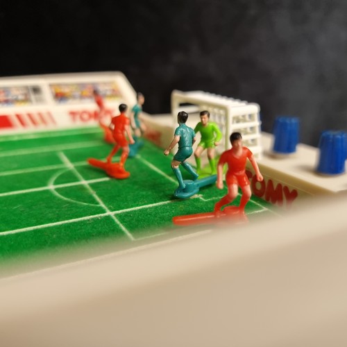 105 - A fantastic and super nostalgic Tomy branded electric Super Cup Football game. Complete in original ... 