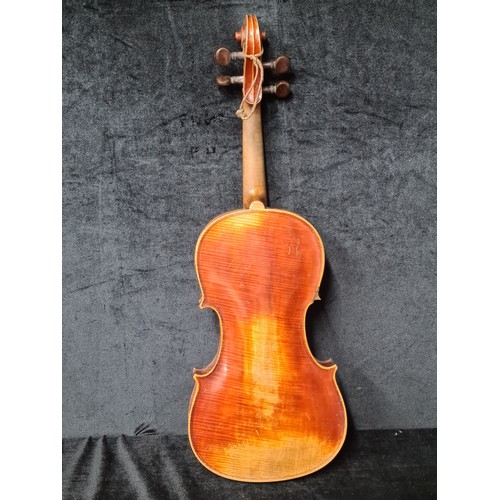 927 - A fantastic antique violin complete with two bows and housed in a hard shell case.