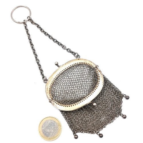 55 - Star Lot : A nice example of a pretty sterling silver mesh purse with suspension chain hallmarked Gl... 