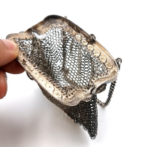 56 - Star lot : A pretty Georgian silver mesh purse hallmarked Birmingham - 1816. Total weight - 44.1 gra... 