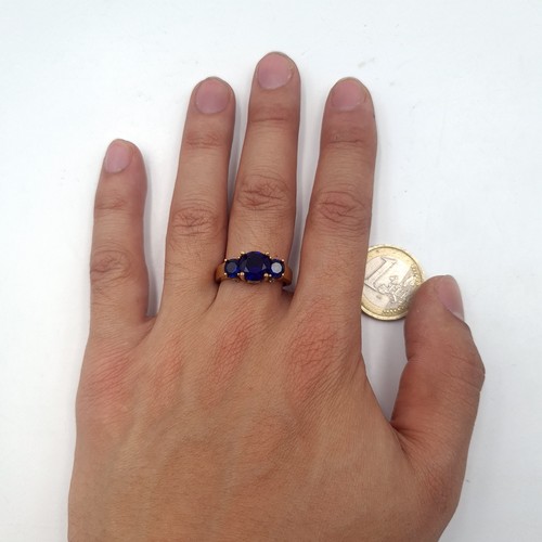 38 - An unusual Sterling Silver Gilt  three stone gem set ring. Ring size - R. Weight - 4.23 grams.