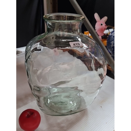 419 - A fabulous Large hand blown clear glass vase with a slightly flared mouth and textured surface with ... 