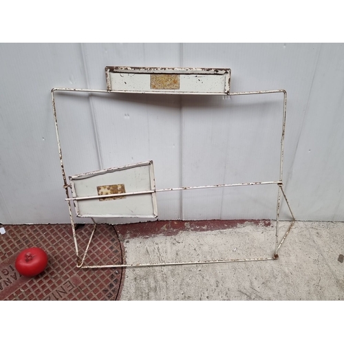 423 - Vintage Clubman wire display rack, featuring two metal plates with 